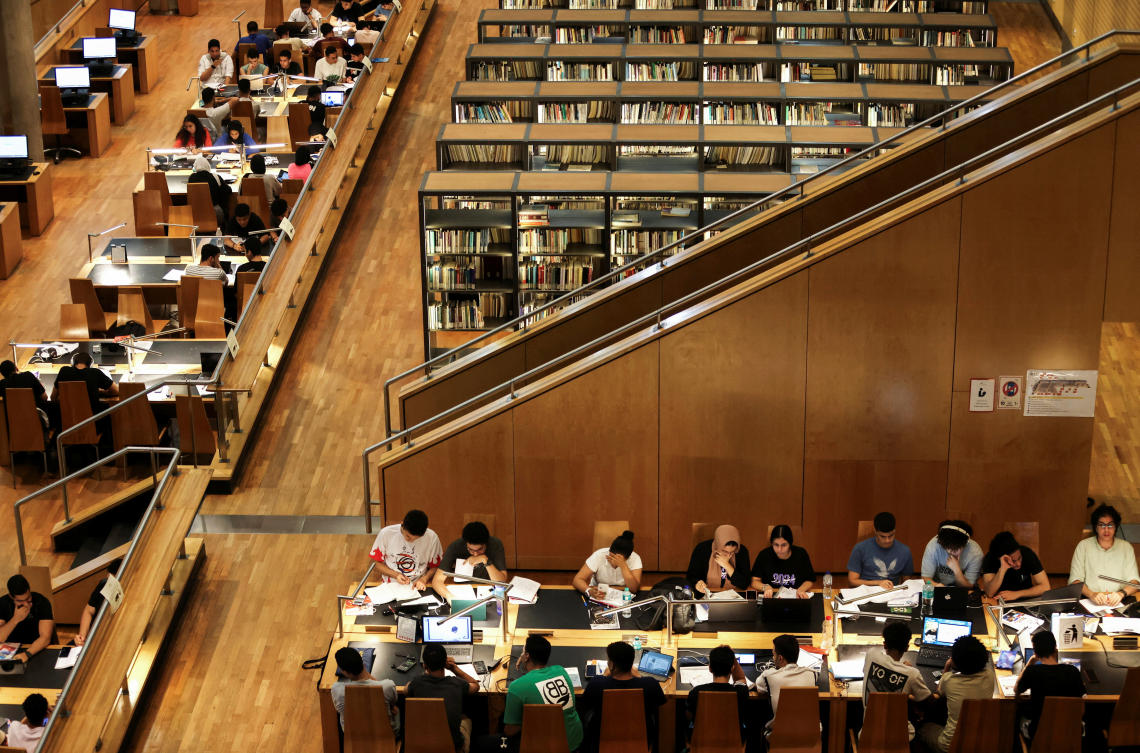 Students study for their high school certificate exams at the blLibrary of Alexandria during the power-off time that the government applied to overcome the overload amid a heatwave, on Jun. 26, 2024. (Reuters)