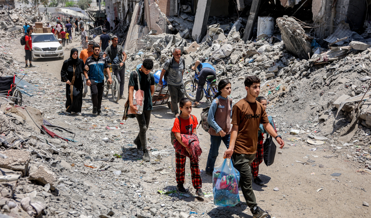 People evacuate from the Tuffah neighbourhood in the east of Gaza City heading towards areas in the west, on June 27, 2024. (AFP/File)