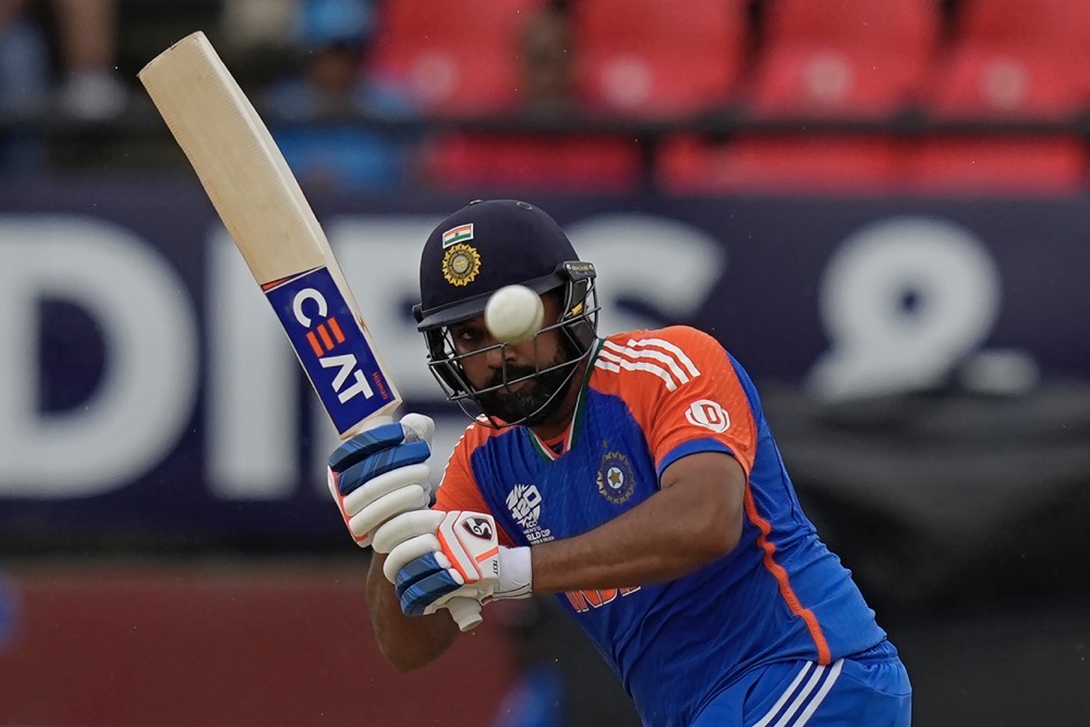 India's captain Rohit Sharma plays a shot during the ICC Men's T20 World Cup second semifinal cricket match between England and India at the Guyana National Stadium in Providence, Guyana. (AP)