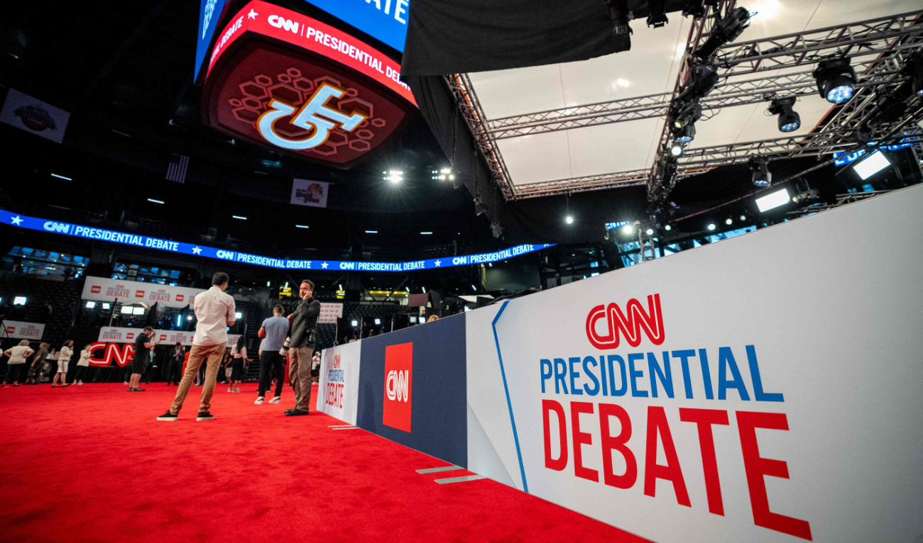 People mingle in the CNN Spin Room ahead of a CNN Presidential Debate on June 27, 2024 in Atlanta, Georgia. (AFP)