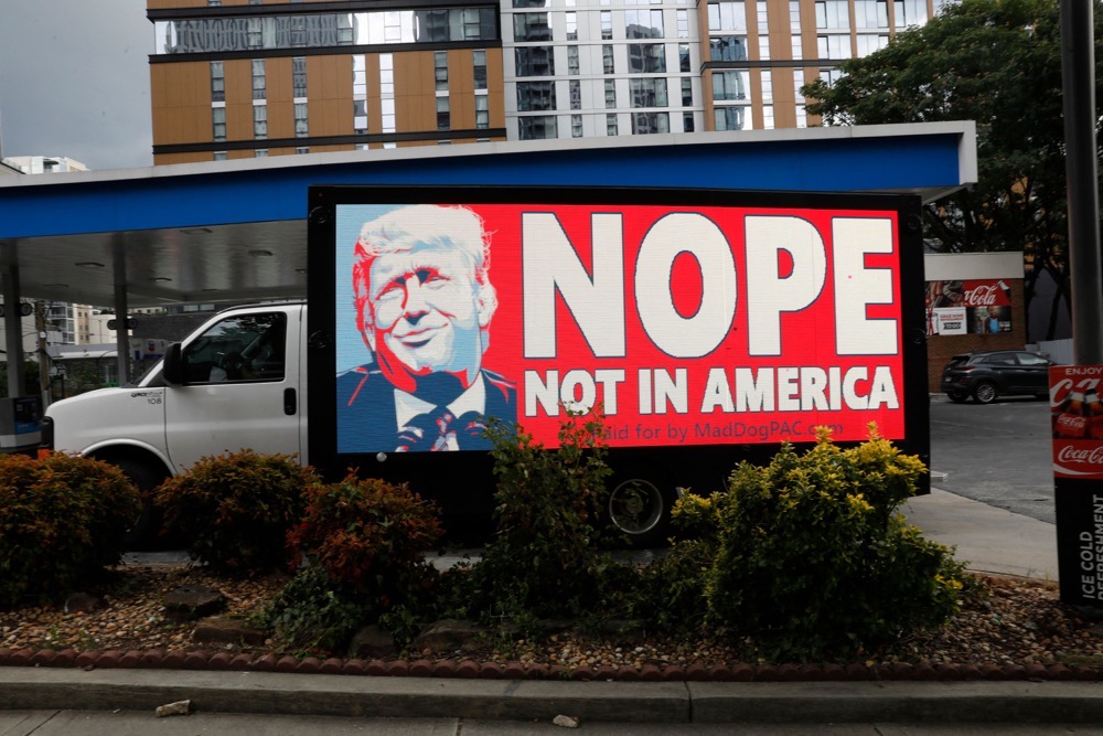 A truck displays large images of former President Donald Trump in the downtown area on June 27, 2024 in Atlanta, Georgia. (Getty Images/AFP)