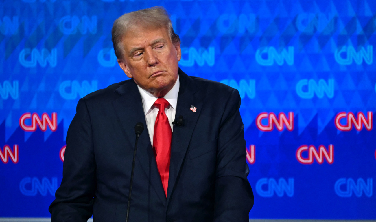 Former US President and Republican presidential candidate Donald Trump looks on as he participates in the first presidential debate of the 2024 elections with US President Joe Biden at CNN's studios in Atlanta, Georgia, on June 27, 2024. (AFP)