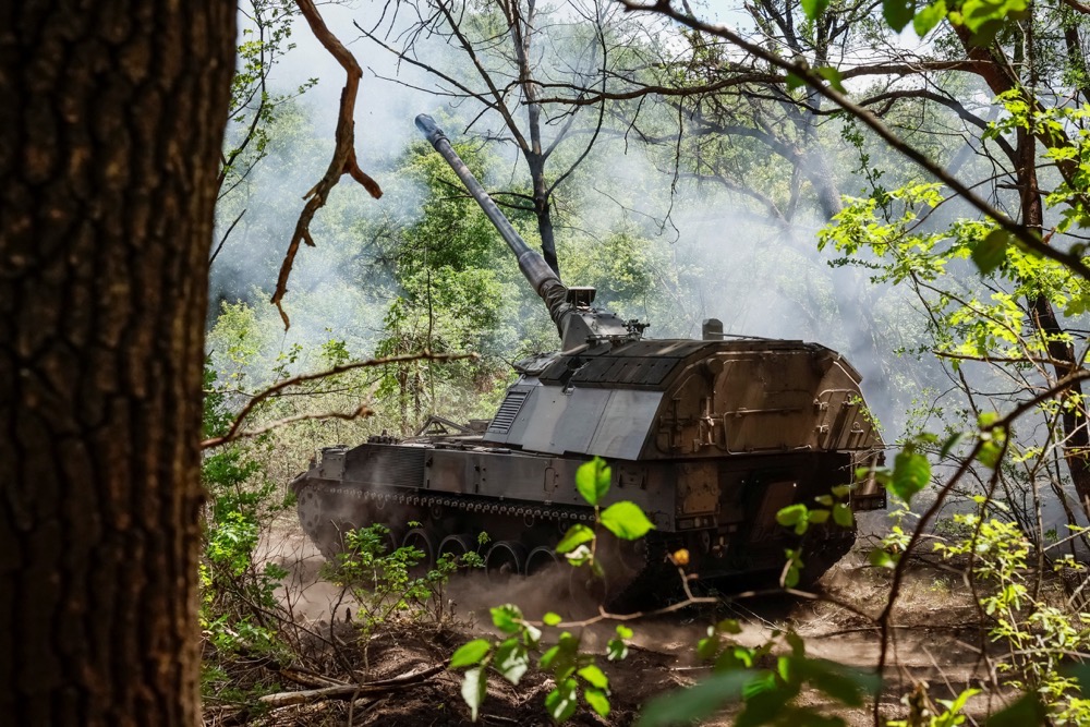 Ukrainian service members of the 43rd Hetman Taras Triasylo Separate Artillery Brigade fire towards Russian troops in a Panzerhaubitze 2000 self-propelled howitzer, amid Russia's attack on Ukraine, at a position near the town of Chasiv Yar, in Donetsk region. (Reuters)