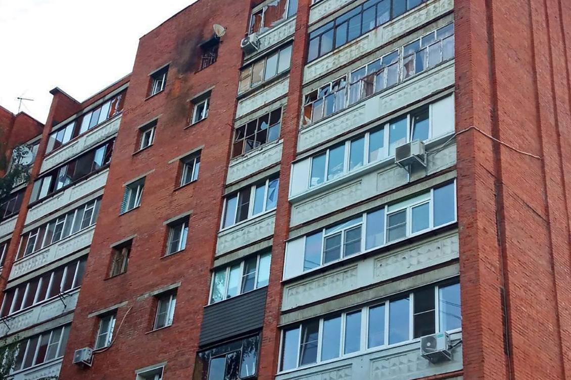 This photograph released on August 27, 2023 reportedly shows a damaged residential building following a drone attack in Kursk, Russia. (AFP)