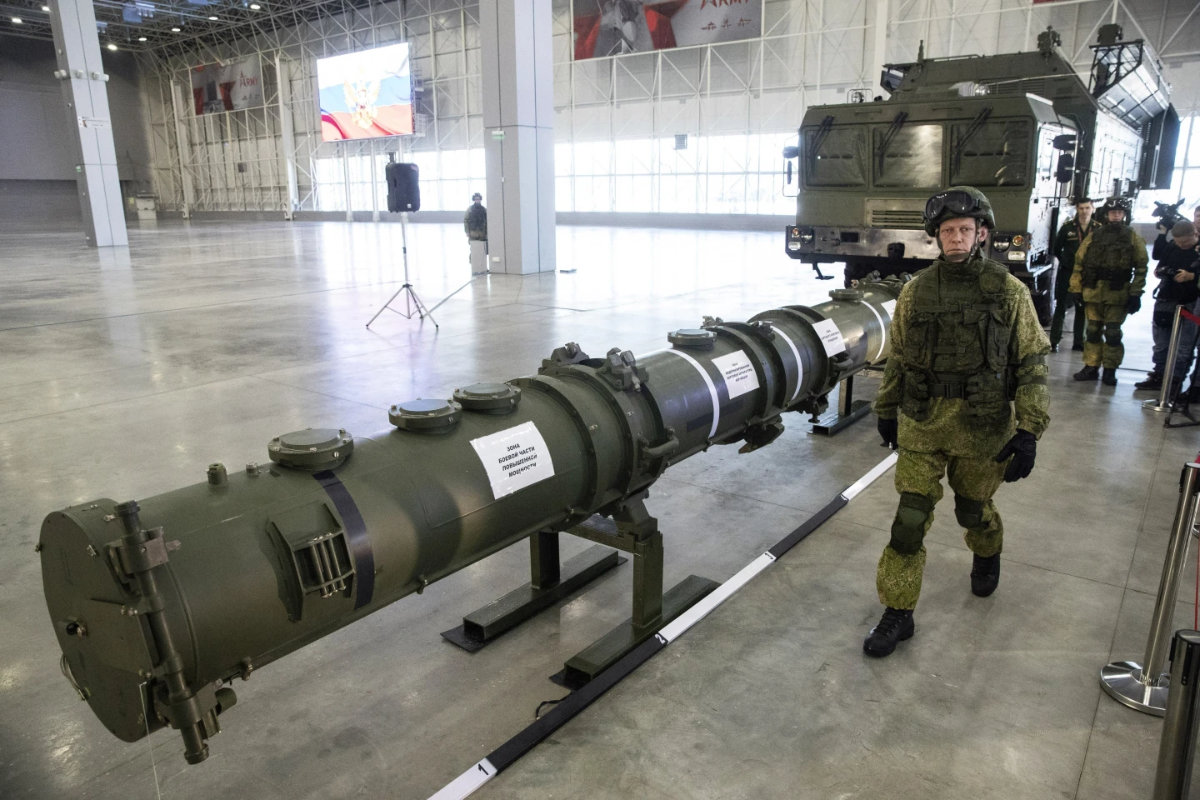 A Russian military officer walks past the 9M729 land-based cruise missile on display in Kubinka outside Moscow on Jan., 23, 2019. (AP)