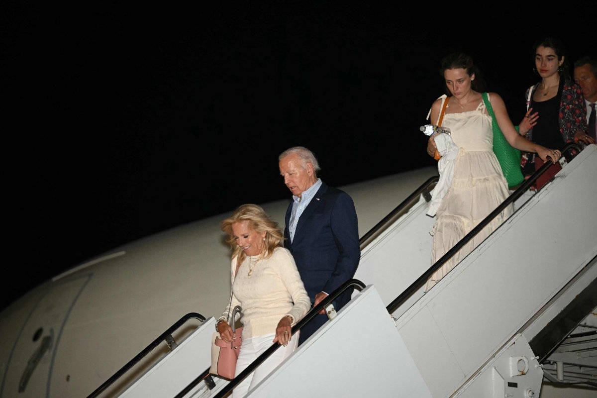 US President Joe Biden, First Lady Jill Biden, granddaughters Natalie (R) and Finnegan (2nd R), step off Air Force One upon arrival at Hagerstown Regional Airport in Maryland enroute Camp David on June 29, 2024. (AFP)