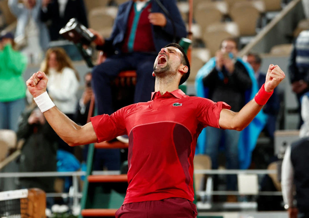 Serbia’s Novak Djokovic celebrates after winning his match against Italy’s Lorenzo Musetti at the French Open on June 1, 2024. (Reuters)