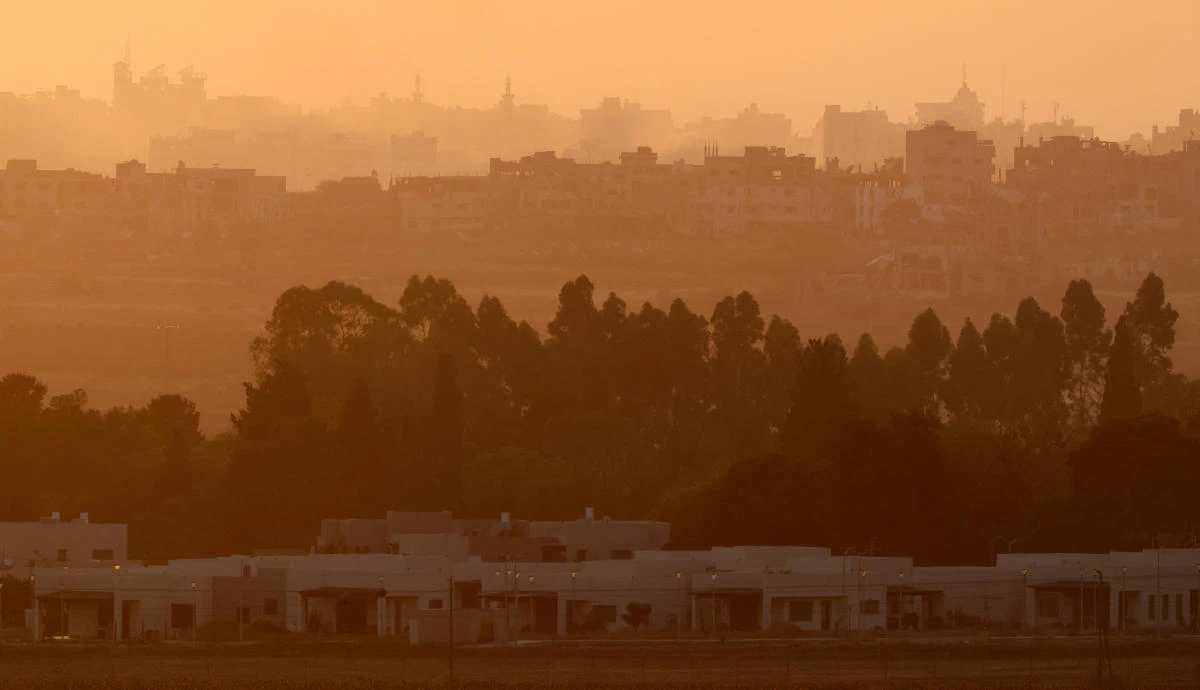 Above, Kibbutz of Nahal Oz in front of Gaza where Hamas militants killed residents or abducted them, and torched homes during their October 7 rampage last year. (Reuters)