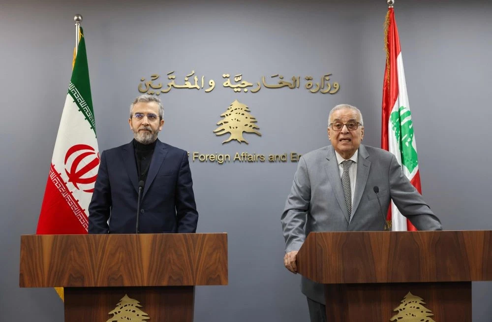 Lebanon’s caretaker Foreign Minister Abdullah Bou Habib, right, and Iran’s acting Foreign Minister Ali Bagheri Kani hold a press conference in Beirut on June 3, 2024. (AFP)