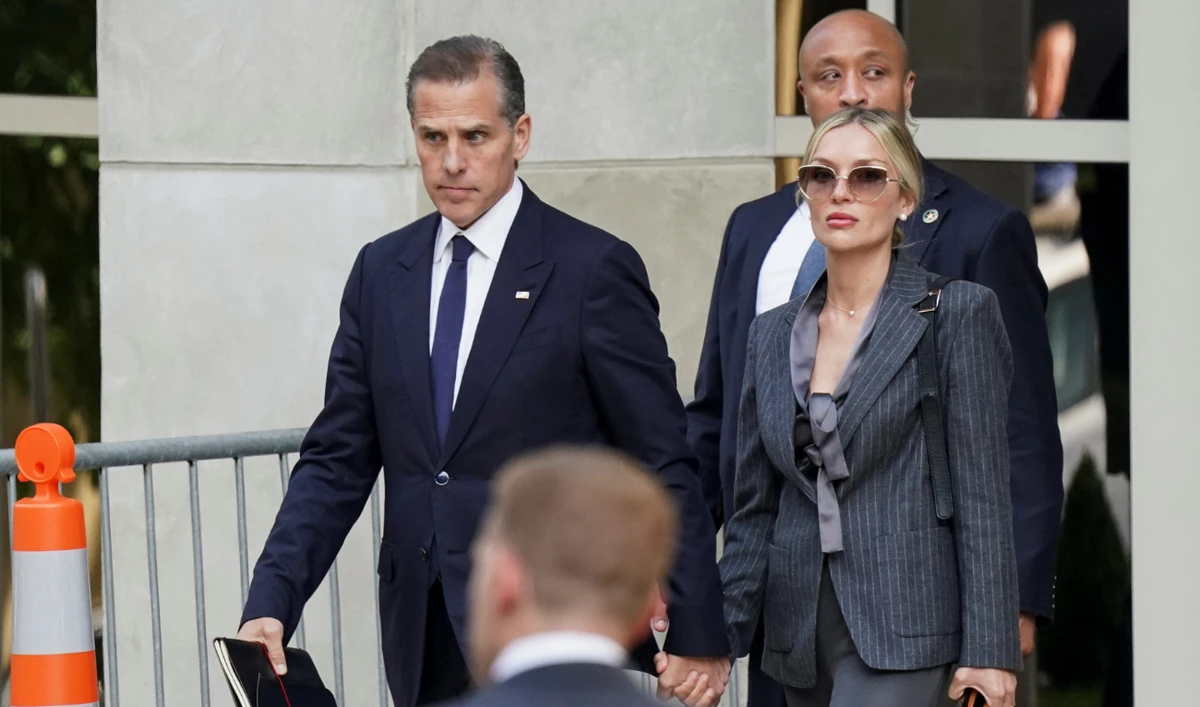Hunter Biden, son of US President Joe Biden, departs the federal court with his wife Melissa Cohen Biden, on the opening day of his trial on criminal gun charges in Wilmington, Delaware, US, June 3, 2024. (Reuters)