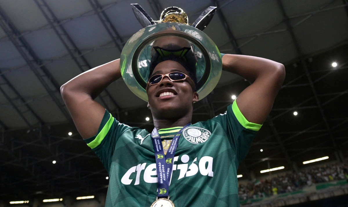 Palmeiras’ Brazilian forward Endrick celebrates with the trophy after winning the Brazilian Championship following the match between Cruzeiro and Palmeiras at Minerao stadium in Belo Horizonte, Brazil, on Dec. 6, 2023. (File/AFP)