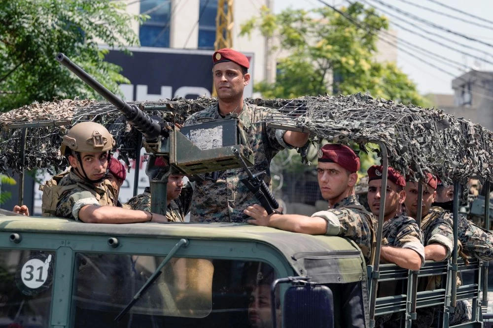 Lebanese special forces patrol a road leading to the US Embassy in Awkar, north of Beirut, Lebanon, Wednesday, June 5, 2024. (AP Photo)