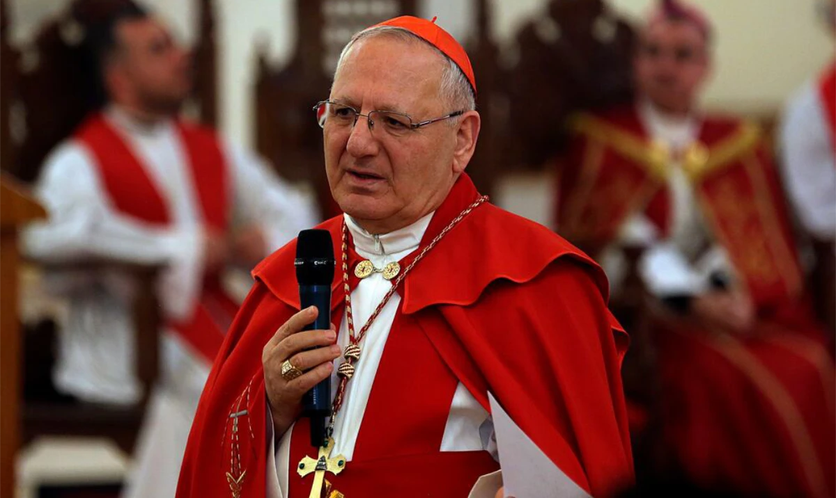 Cardinal Louis Sako addresses the faithful during the Palm Sunday service at Mar Youssif Church in Baghdad. (AP/File)