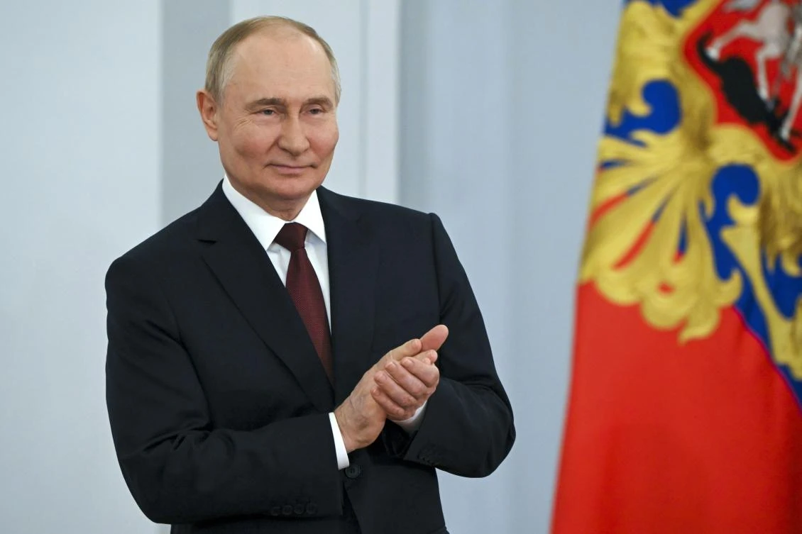 Russian President Vladimir Putin applauds at a ceremony for presenting the Russian Federation National Awards during the celebration the Day of Russia at the Kremlin in Moscow, Russia. (File/AP)