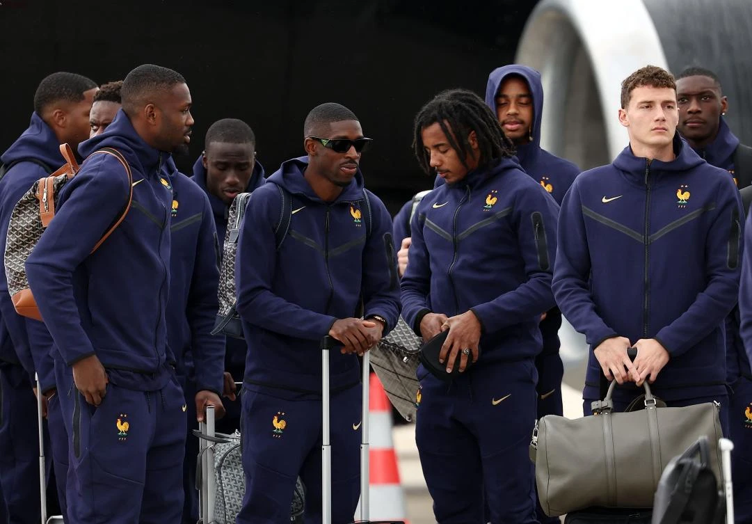 France’s forward Ousmane Dembele, center, arrives with teammates ahead of Euro 2024 at Paderborn Lippstadt airport, Germany, June 12, 2024. (AFP)
