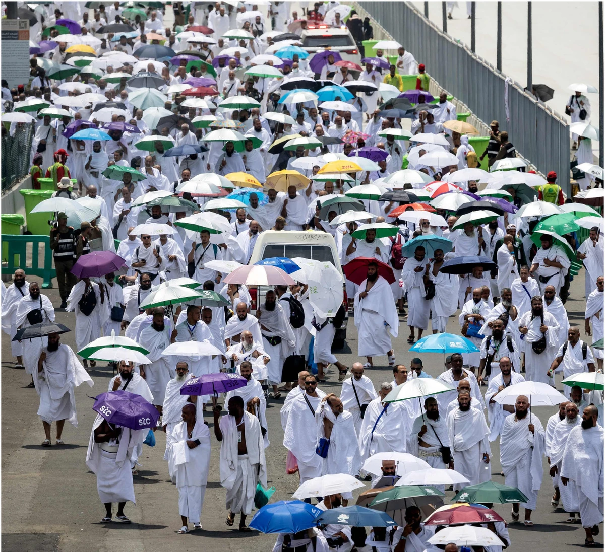 Hajj pilgrims arrive on June 14, 2024, at the tent city of Mina, near the holy city of Makkah, as the annual pilgrimage begins in exhausting summer heat. (AFP)