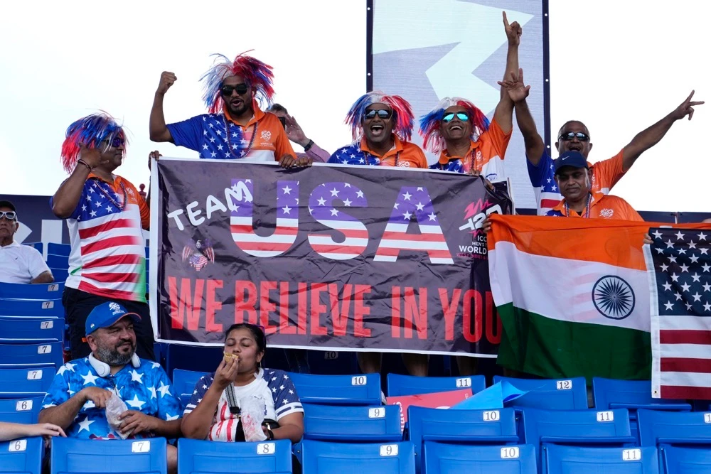 Fans of the United States cricket team cheer at Central Broward Regional Park Stadium in Lauderhill. (AP)