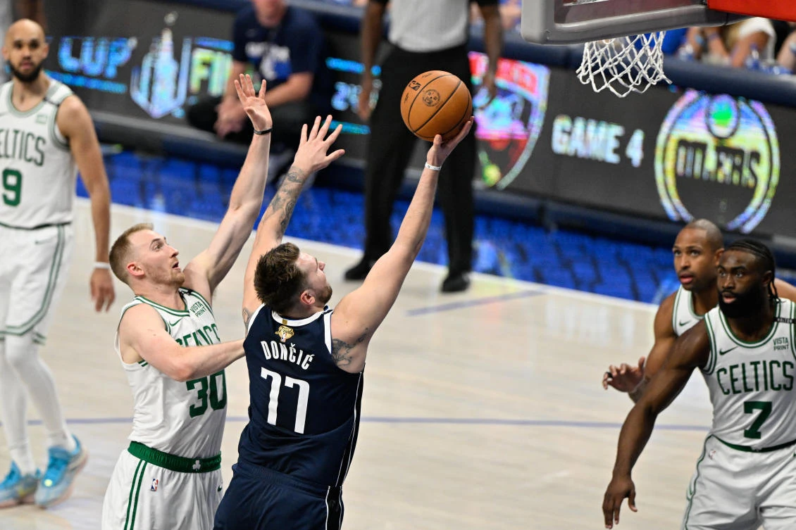 Luka Doncic scored 25 of his 29 points in the first half as Dallas Mavericks handed Boston Celtics their first road defeat of the playoffs. (USA TODAY Sports)