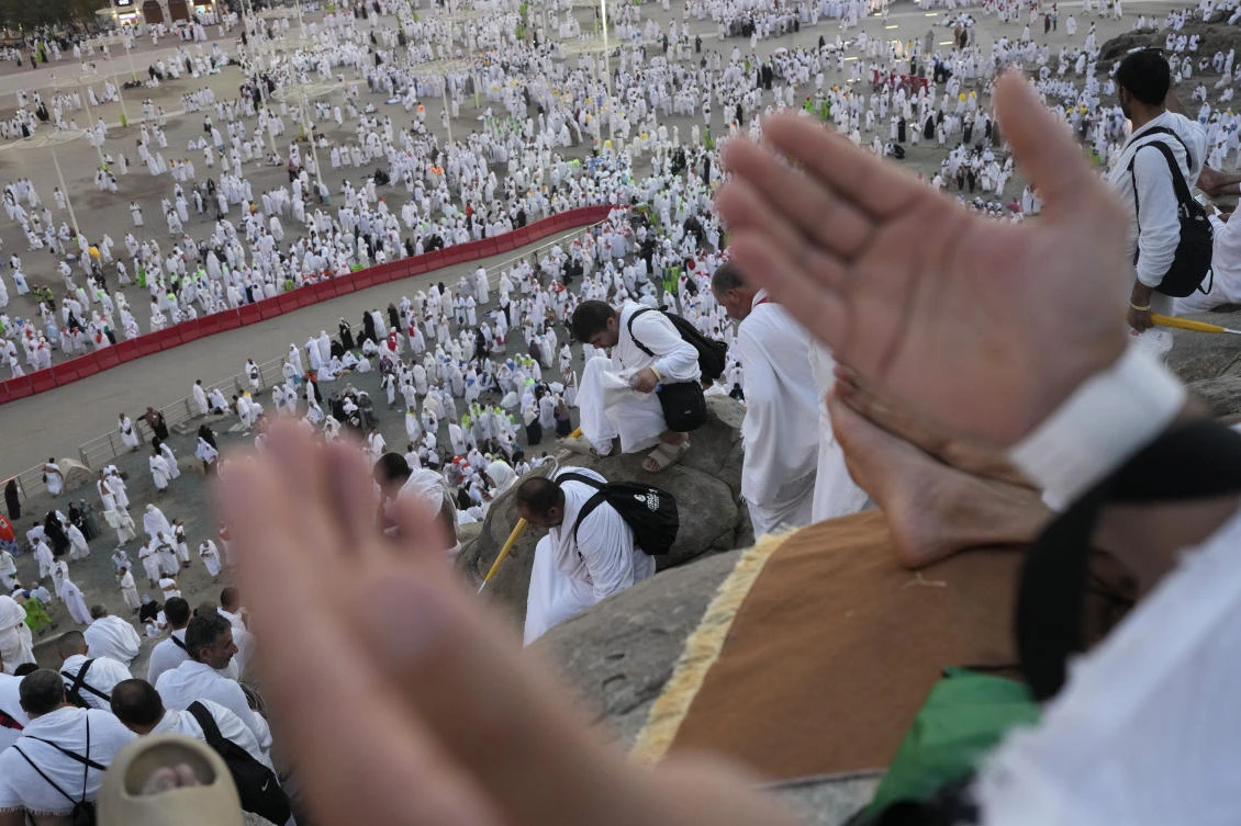 Muslim pilgrims gather at top of the rocky hill known as the Mountain of Mercy, on the Plain of Arafat, during the annual Hajj pilgrimage, near the holy city of Mecca, Saudi Arabia, Saturday, June 15, 2024. (AP)