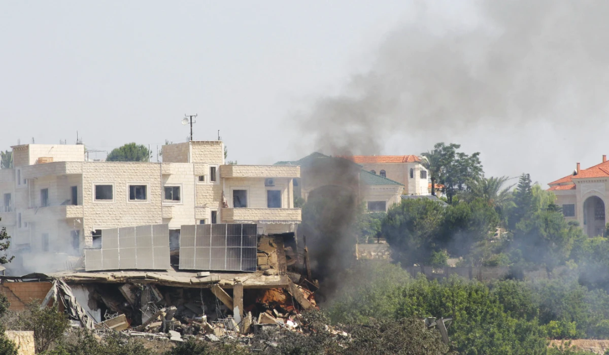Black smoke billows from a fire caused by an Israeli airstrike on Jennata east of the southern Lebanese port city of Tyre on June 14, 2024. (AFP)