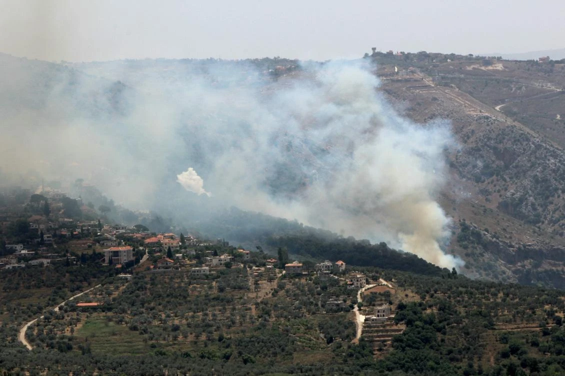 Smoke billows from fires ignited by Israeli shelling on the forested areas of the southern Lebanese village of Deir Mimas on Jun. 15, 2024, amid ongoing cross-border clashes between Israeli troops and Hezbollah fighters. (AFP)