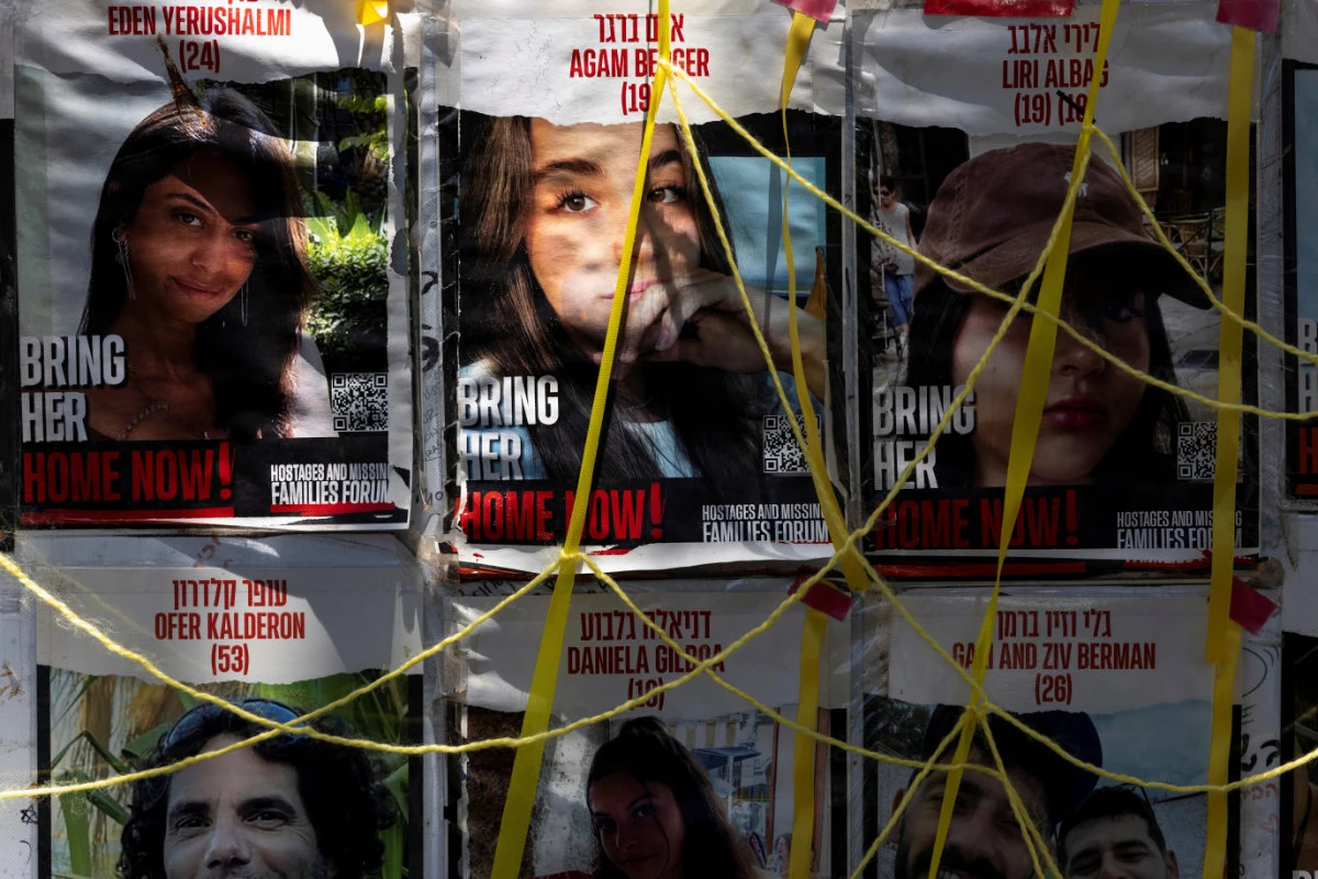 Posters of hostages, kidnapped during the deadly October 7 attack on Israel by Hamas, hang amid the ongoing Israel-Hamas conflict, in Tel Aviv, Israel, June 17, 2024. (Reuters)