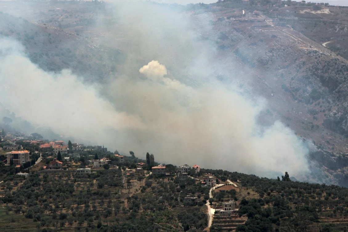 Smoke billows from fires ignited by Israeli shelling on the forested areas of the southern Lebanese village of Deir Mimas on Jun. 15, 2024, amid ongoing cross-border clashes between Israeli troops and Hezbollah fighters. (AFP)