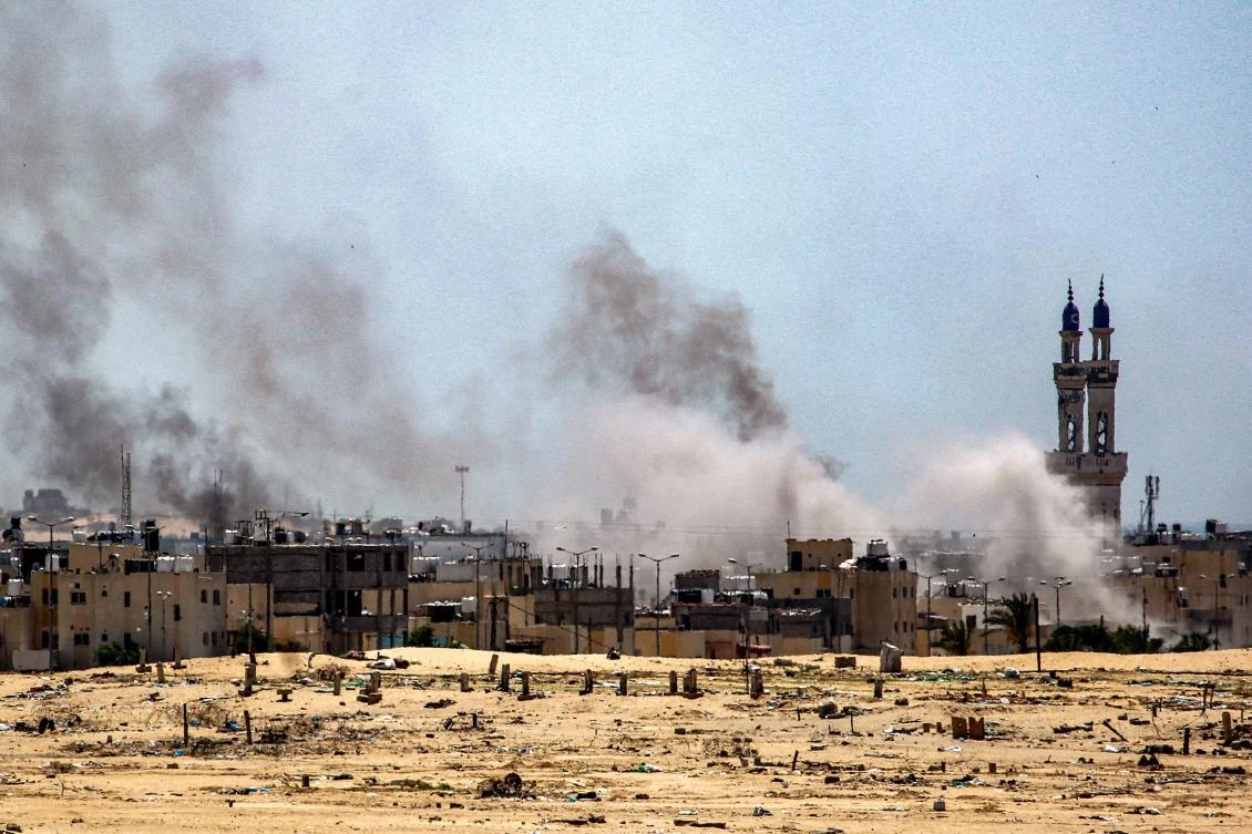 Smoke plumes billow after Israeli drone strikes and shelling in the Sultan neighborhood northwest of Rafah in the southern Gaza Strip earlier on June 18, 2024. (AFP)