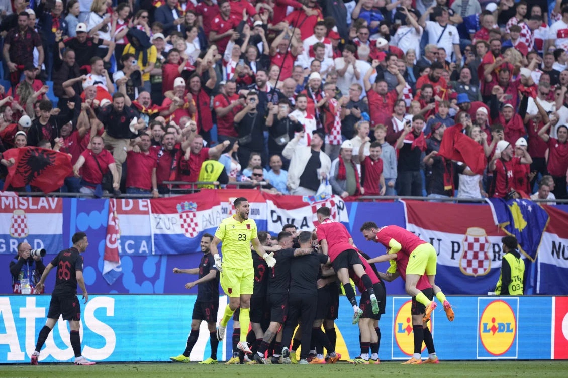 Albania players celebrate after Klaus Gjasula scored the equalizer against Croatia at Euro 2024 in Hamburg, Germany, Wednesday, June 19, 2024. (AP Photo)