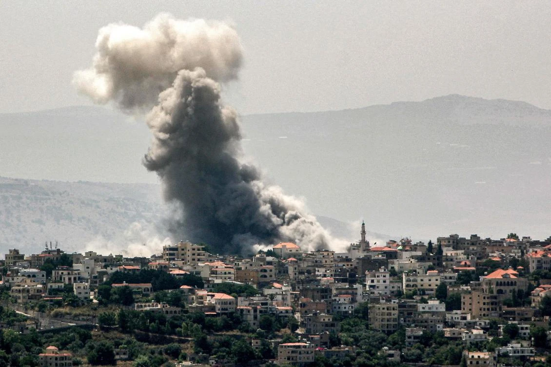 Smoke billows during Israeli bombardment on the village of Khiam in south Lebanon near the border with Israel on Jun. 19, 2024. (AFP)