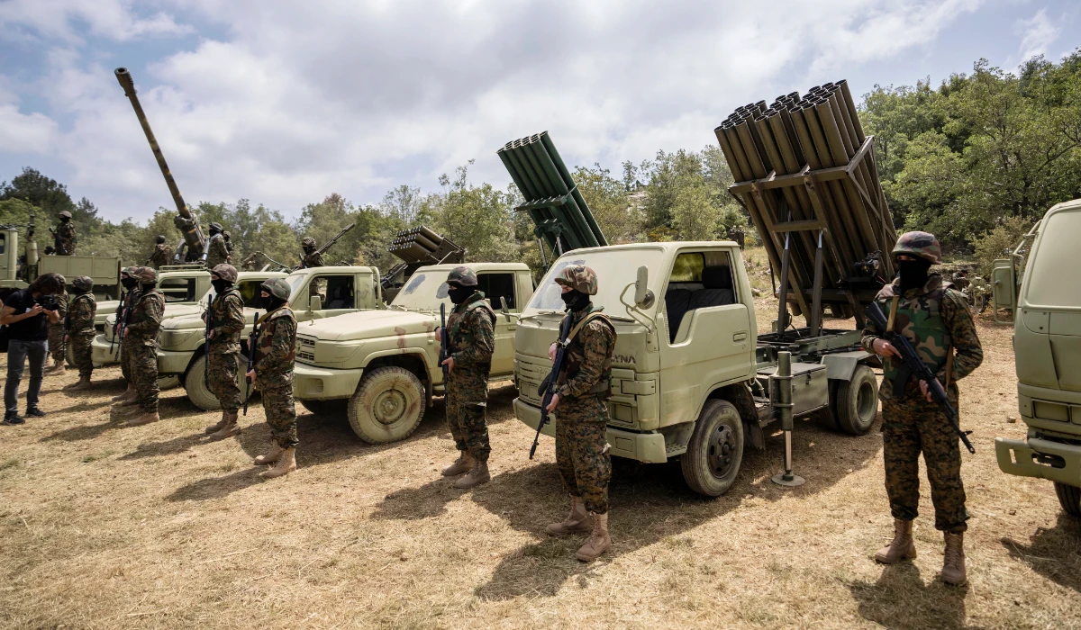 Fighters from the Lebanese militant group Hezbollah carry out a training exercise in Aaramta village in the Jezzine District, southern Lebanon, Sunday, May 21, 2023. (AP)