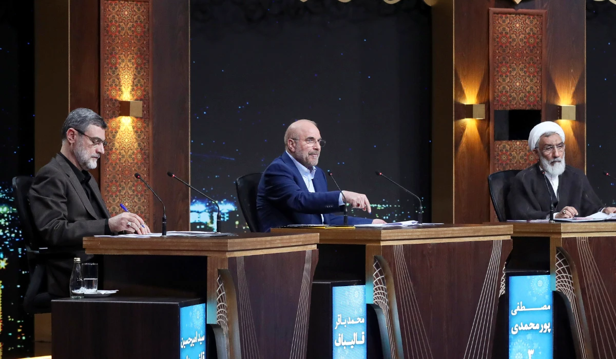Iran's Parliament Speaker Mohammad Bagher Qalibaf, a presidential candidate for the June 28 election, center, speaks as other candidates Mostafa Pourmohammadi, a former Minister of Justice, right, and Amirhossein Ghazizadeh Hashemi, Vice President of late Ebrahim Raisi, listen in a debate of the candidates at the TV studio in Tehran, Iran, Thursday, June 20, 2024. (AP)
