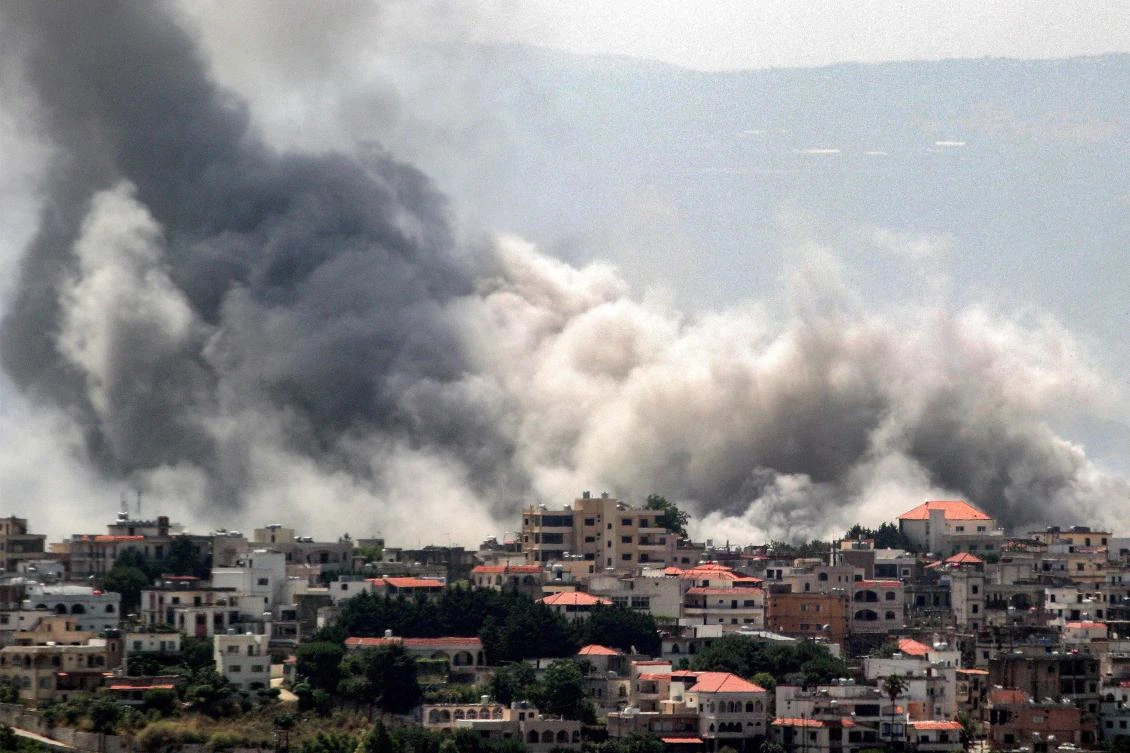 Smoke billows during Israeli bombardment on the village of Khiam in south Lebanon near the border with Israel on Jun. 8, 2024. (AFP)