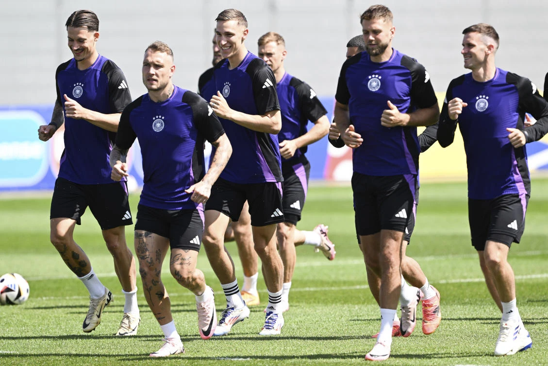 Germany’s Robin Koch, David Raum, Nico Schlotterbeck, Niclas Fullkrug and Pascal Gross attend a training session in Herzogenaurach, Germany, on Jun. 22, 2024, ahead of their match against Switzerland on June 23. (AP)