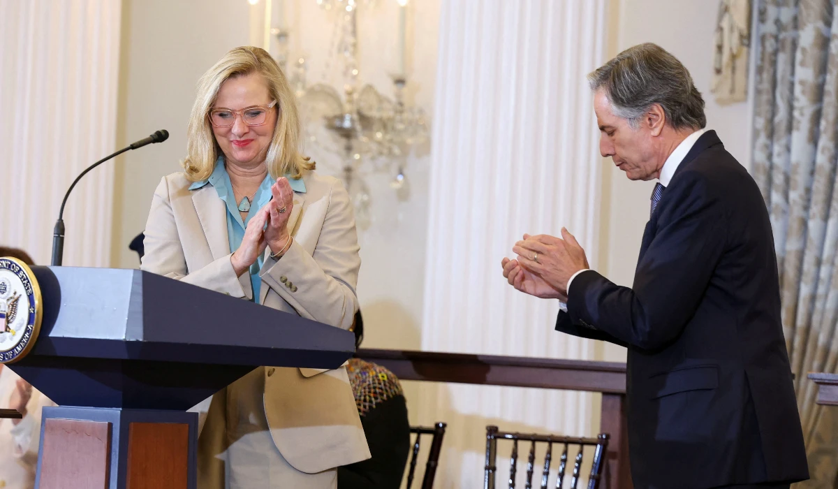 Cindy Dyer, Ambassador-at-Large to Monitor and Combat Trafficking in Persons, left applauds next to U.S. Secretary of State Antony Blinken before delivering remarks during the release of the 2024 Trafficking in Persons (TIP) Report at the State Department in Washington, U.S., June 24, 2024. (REUTERS)