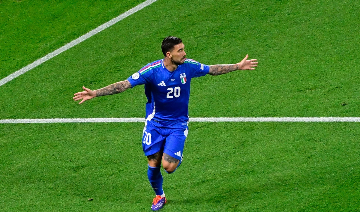 Italy’s forward #20 Mattia Zaccagni celebrates scoring his team’s first goal during the UEFA Euro 2024 Group B football match against Croatia at the Leipzig Stadium in Leipzig on June 24, 2024. (AFP)
