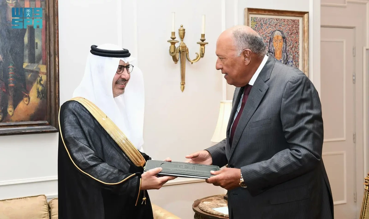 Saudi ambassador to Egypt Saleh bin Eid Al-Husseini hands over his credentials to Egyptian Foreign Minister Sameh Shoukry in Cairo on Tuesday. (SPA)