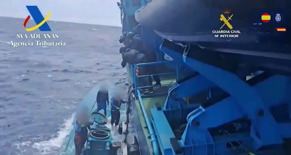 A screengrab taken from a video showing Spanish authorities intercepting a submarine suspected of transporting drugs to Europe from South America and arrested four Colombian nationals on Thursday. (X/@guardiacivil)