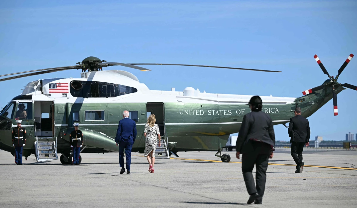 US President Joe Biden and First Lady Jill Biden board Marine One upon arrival at John F. Kennedy International Airport in New York, New York on June 28, 2024. (AFP)