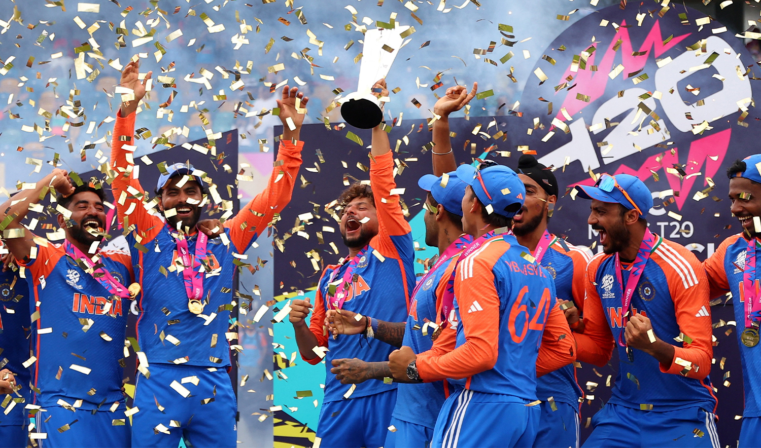 India's Kuldeep Yadav lifts the trophy as they celebrate after winning the T20 World Cup at Kensington Oval in Bridgetown, Barbados, on June 29, 2024. (REUTERS)