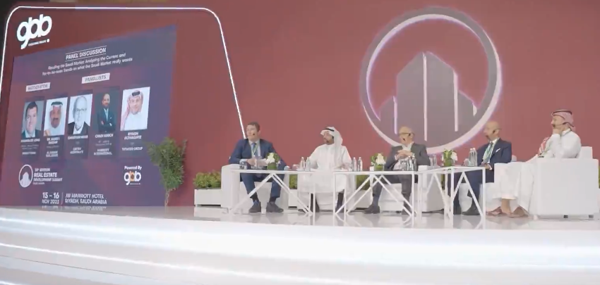 A panel discussion at the Real Estate Development Summit held in November 2023. Screenshot