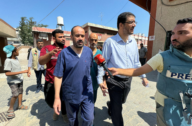 Mohammed Abu Salmiya, center, the head of Gaza’s biggest hospital, was detained in November by Israeli forces. (Reuters)