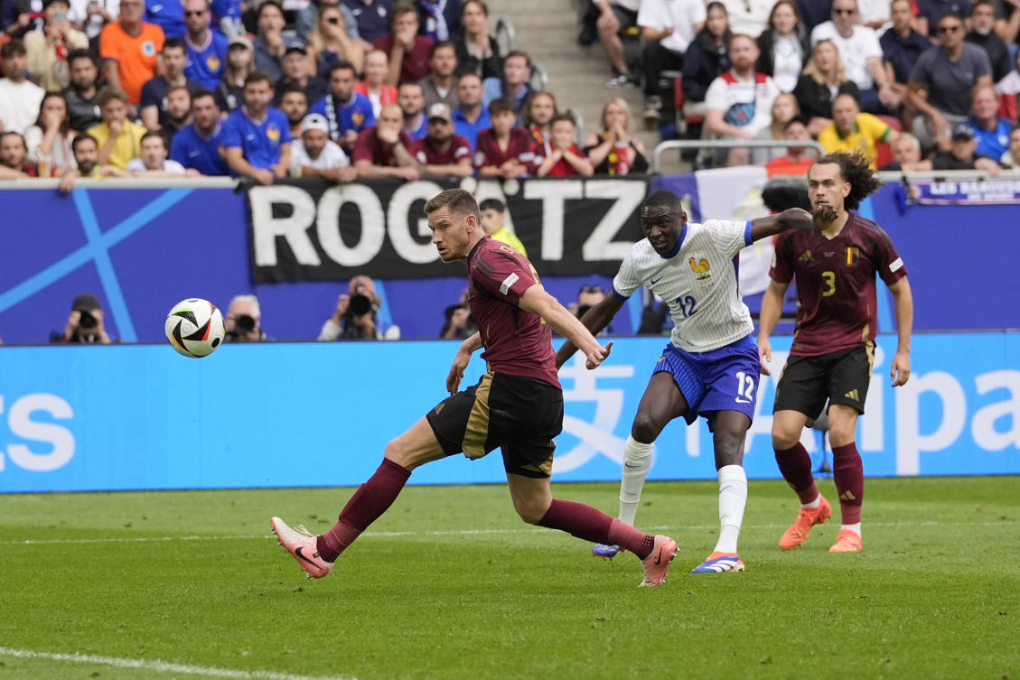 Randal Kolo Muani of France scores via a deflection off Belgium’s Jan Vertonghen in Duesseldorf, Germany, Monday, July 1, 2024. (AP Photo)