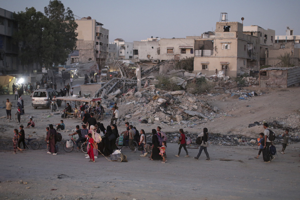 Palestinians displaced by the Israeli air and ground offensive on the Gaza Strip flee from parts of Khan Younis following an evacuation order by the Israeli army to leave the eastern part of Gaza Strip's second largest city on Monday, July 1, 2024. (AP)