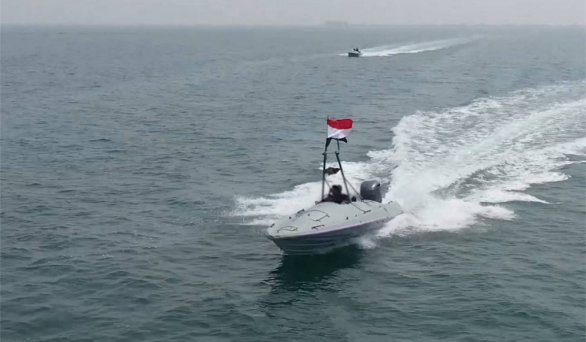 A handout picture obtained from Yemen's Huthi Ansarullah Media Center on June 30, 2024, shows what they said is the 'Tufan Destroyer' unmanned boat during exercises in an undisclosed area at sea. (AFP)