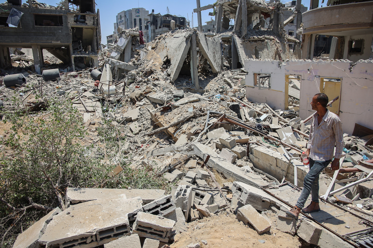 A Palestinian man inspects the destruction in the Tal Al-Hawa neighbourhood in southern Gaza City on June 5, 2024. (File/AFP)