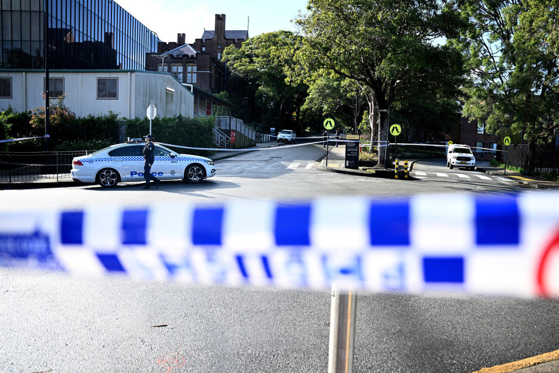 Above, New South Wales police work at the scene of an alleged stabbing at the University of Sydney on July 2, 2024. (AAP via Reuters)