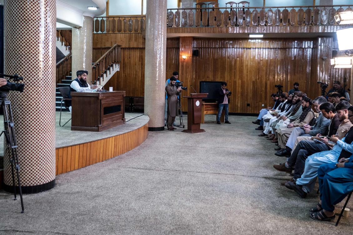 Taliban spokesman Zabihullah Mujahid, left, said discussions over a prisoner exchange were held with US representatives during United Nations-led talks in Qatar. (AFP)