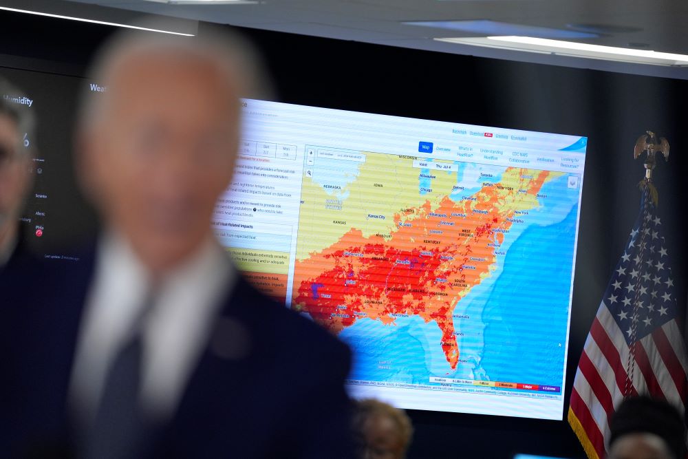 A map of the United States is seen as President Joe Biden speaks during a visit to the D.C. Emergency Operations Center, Tuesday, July 2, 2024, in Washington. (AP Photo)