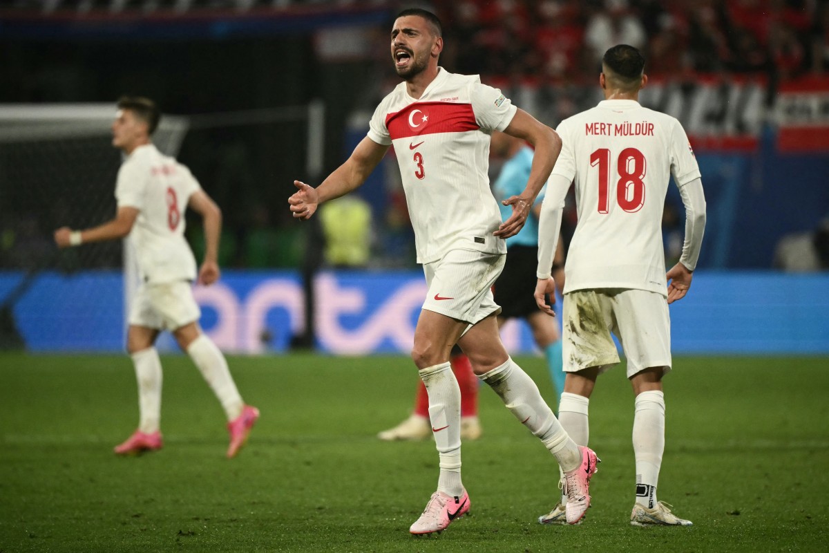 Turkey's defender #03 Merih Demiral (C) celebrates scoring his team's second goal during the UEFA Euro 2024 round of 16 football match between Austria and Turkey at the Leipzig Stadium in Leipzig on July 2, 2024.(AFP)
